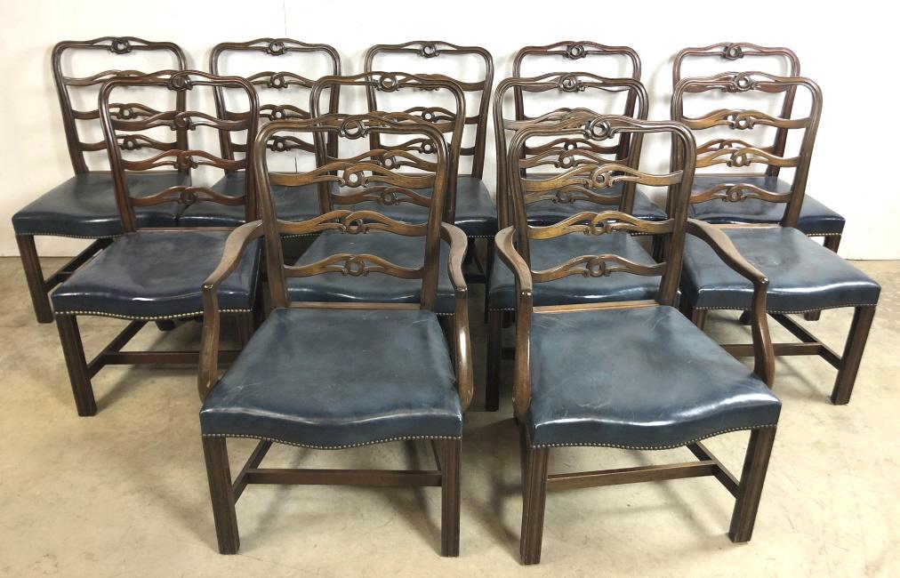 Set of 11 Kittinger ribbon back dining chairs: Including 2 armchairs Armchair 38"h x 25 1/4"w x 21"d Side chair 38"h x 22"w x 19 1/2"d Condition, overall wear, scratches, scuffs, some cracking to leather