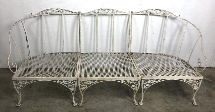 Three section wrought iron patio settee: 33"h x 80 3/4"w x 28 1/2"d Condition, some minor rust