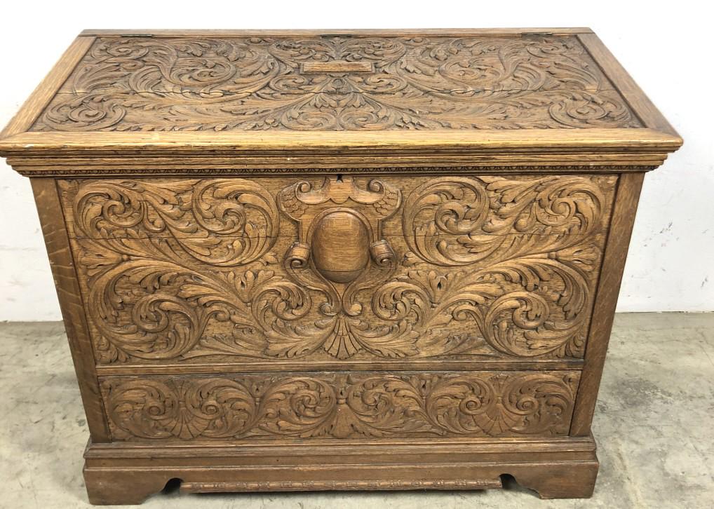 Highly carved oak blanket chest: 30 3/4"h x 39 3/4"w x 20 3/4" d Condition, alterations to front, some cracks, scratches and scuffs