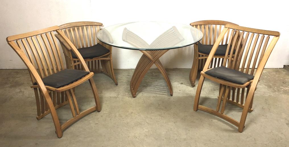 Sunroom teak folding table and chair: With two side and two armchairs Table 28 1/2"h x 47 1/2"dia Condition, needs oiling