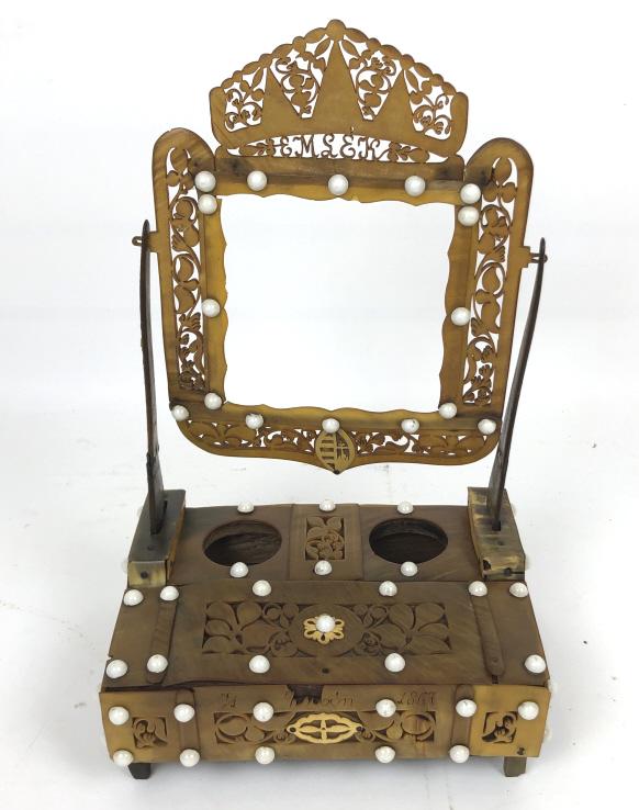 Scandinavian horn shaving mirror: 15"h x 9 1/4"w x 6 3/4"d Condition, missing mirror, some cracks and loss of horn loss