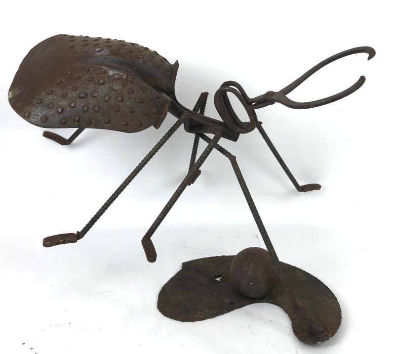 Metal beetle sculpture: 22 1/2"h x 29 1/4"w x25"d Condition,rusty patina
