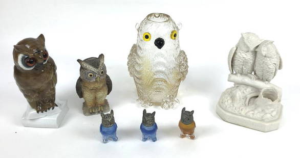 Group of 7 porcelain and glass owls: Tallest 8 1/4" Condition, Some chips to wings of large glass owl, one blue glass shaker has chipped foot, crystals eyes missing from shakers.