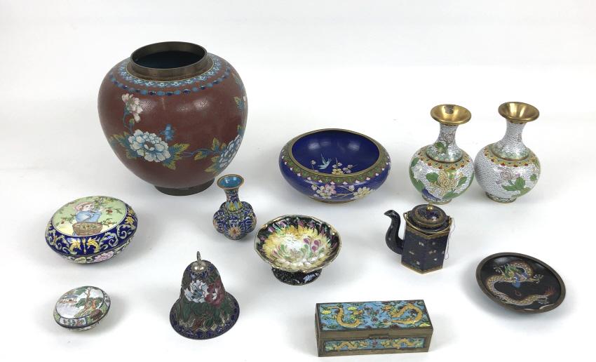 Group of cloisonne and enamel articles: Approximately 11 pieces Largest 7 3/4"h x 7 1/2" dia Condition, light wear, chipped lid on pill box, some chips on bottom of dragon dish