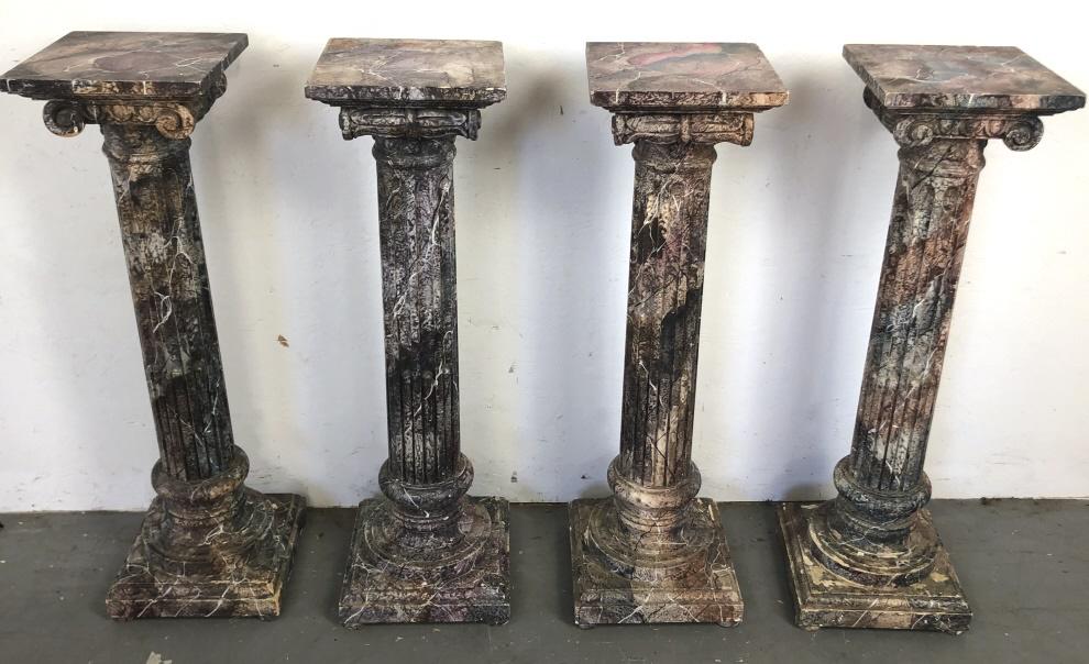 Set of 4 faux marble column form pedestals: Faux marble painted on wood, made in Italy 36"h x 11" sq Condition, some paint loss, wear to edges, writing on two pedestals