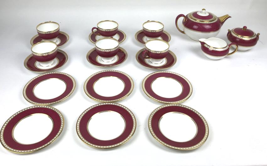 Wedgwood Ulander porcelain tea set: Comprising, 6 cups and saucers, 6 side plates, teapot, sugar and creamer Condition, one cracked plate, some scratches