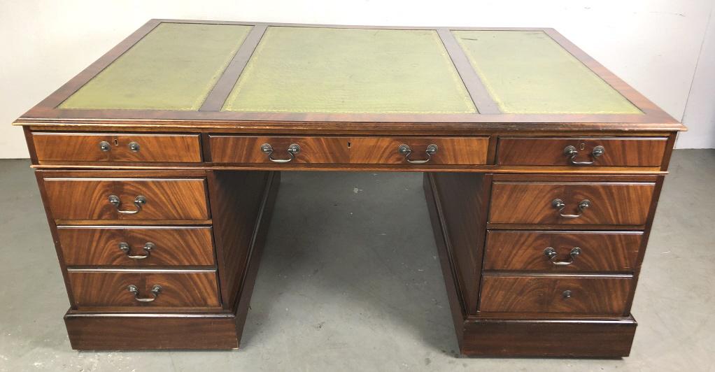 Mahogany and leather top partners desk: 31 1/4"h x 70"w x 44"d Condition, scratches, dings, two missing handles