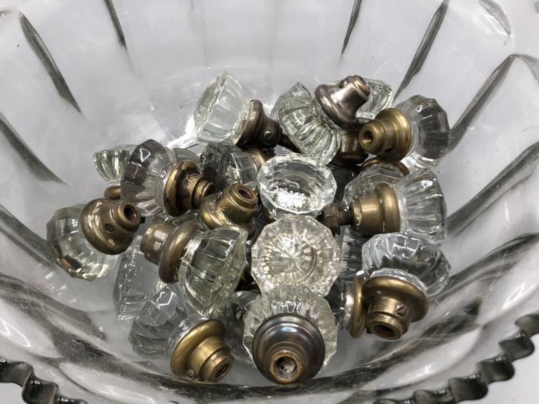 Glass punch bowl with 25 glass door knobs: Bowl 7"h x 14 1/2"dia Condition, some scratches