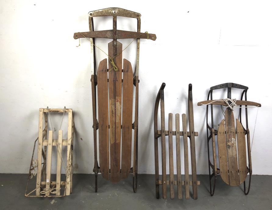Group of 4 sleds: Largest 60" l Condition, overall wear