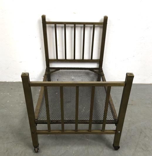 Diminutive brass bed: 22"h x 29 3/4"w x 18"d Condition, some replaced bolts, needs cleaning