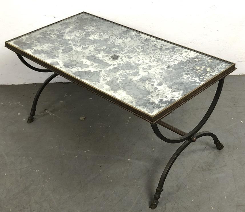 Neoclassical style metal and mirror top low table: 163/4"h x 35 3/4"w 18 1/2"d Condition, needs cleaning, some scratches and loss of mirror silvering