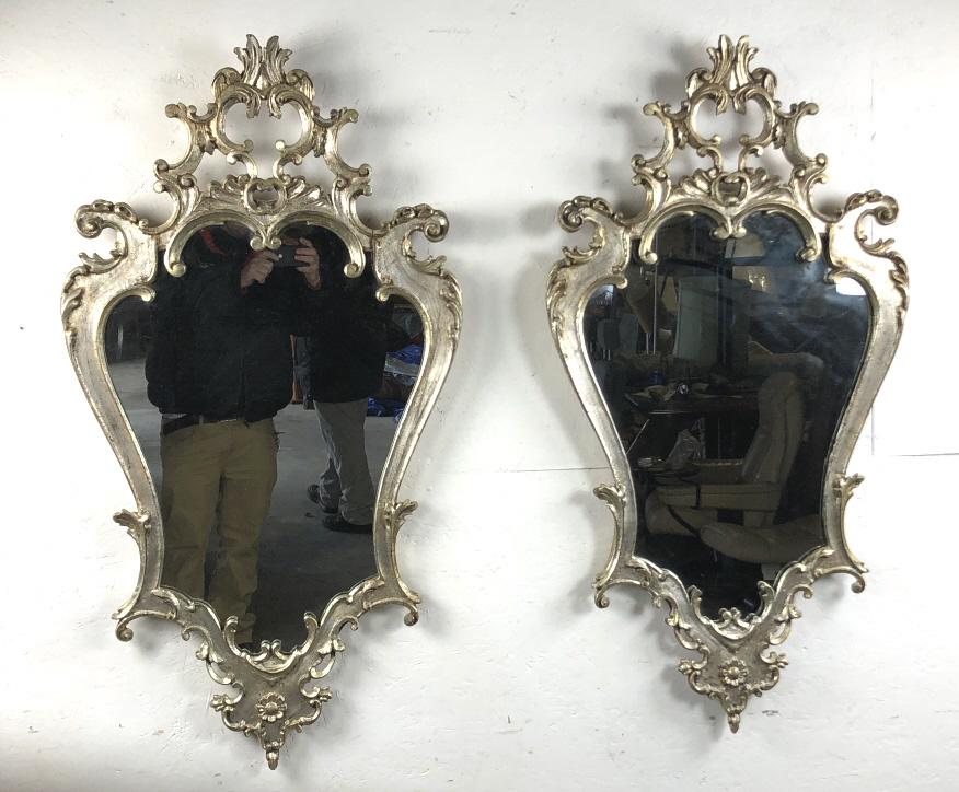 Pair of Le Berge silver wood mirrors: 48"h x 25 1/2"w Condition, some chipped silvering, scratches