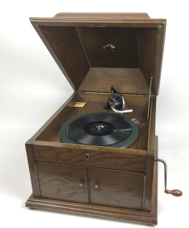 RCA oak table Victrola: 15"h x 18 1/4"w x 22 1/2"d Condition, chip to lid, some scuffs and scratches