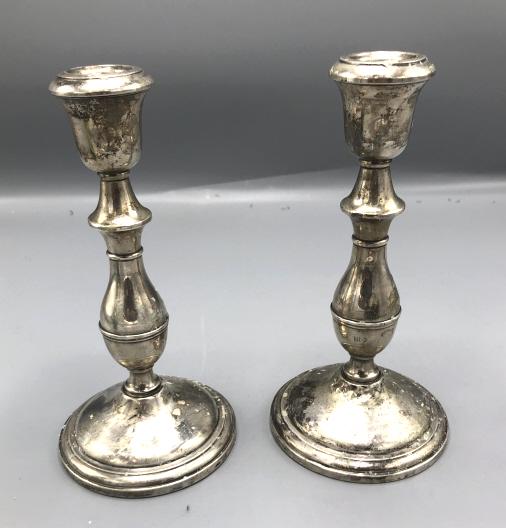 Pair of weighted sterling silver candlesticks (1 of 4)