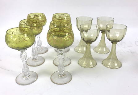 A Set of Green and Gilt Decorated Crystal Glasses: Together with 4 Challis Style Glasses . Green and Gilt Glasses are 6 3/4" H. Condition of green and gilt glasses, chip on 1 base, rubbed gilt. Condition of Challis Style glasses, Chips on