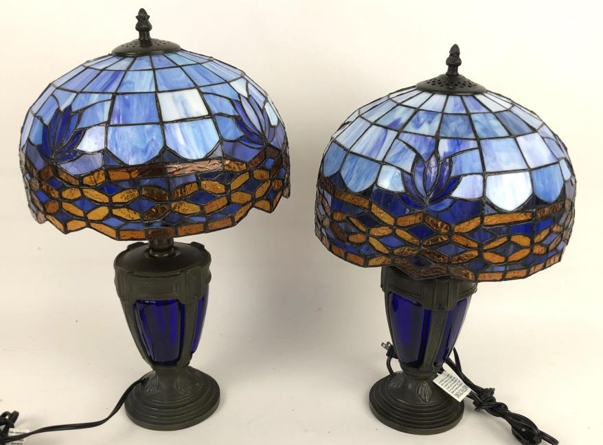 A Pair of Tiffany Style Blue Stained Glass Lamps: 21 1/2" h x 12" d. Condition, 1 harp is taller then the other