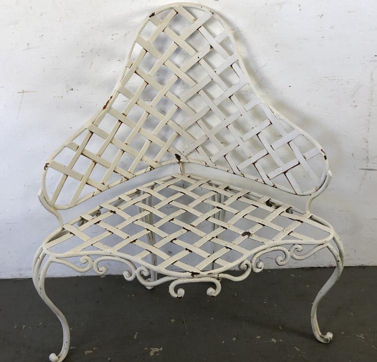 Wrought Iron Corner Patio Chair 39 1/2" h x 35 1/2" w x: Wrought Iron Corner Patio Chair 39 1/2" h x 35 1/2" w x 20" d. Condition, some paint loss and minor rust