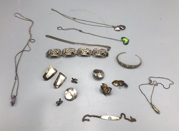 A Group of Sterling Silver Jewelry Including bracelets, (1 of 4)