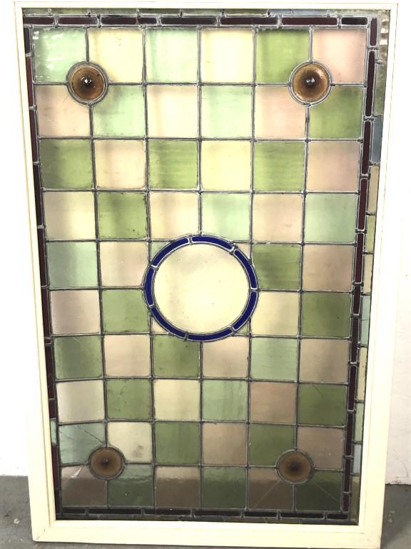 A Framed Stain Glass Window 54 1/2"h x 29 1/2"w: 54 1/2"h x 29 1/2"w Condition, some cracked panes, one pane missing glass