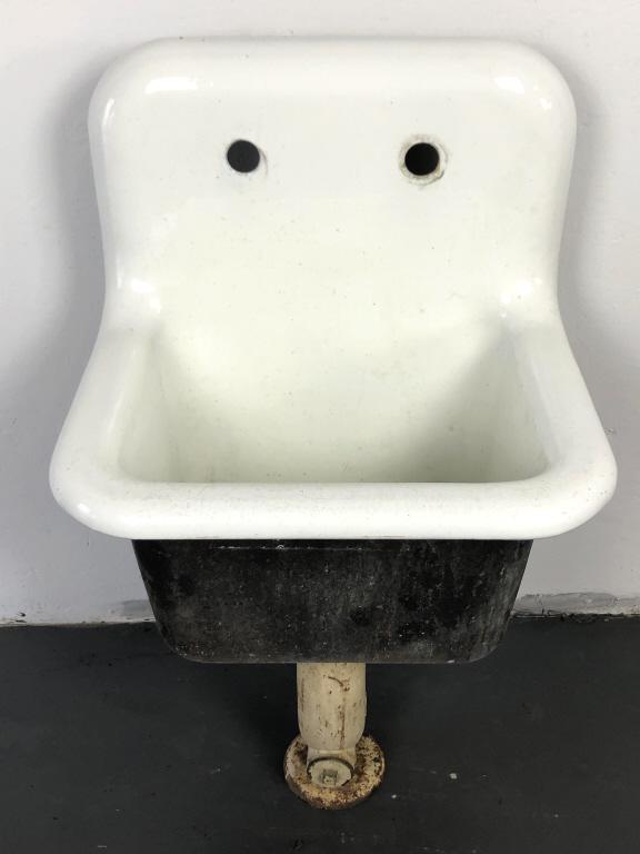 Cast Iron and Enamel Slop Sink 39 1/2"h x 23"w x18"d: 39 1/2"h x 23"w x18"d Condition, some scratches and water discoloration around drain