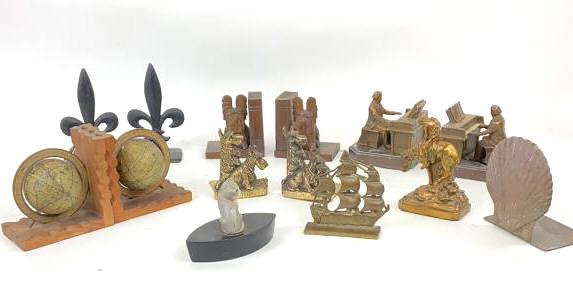 Lot of Bookends and Doorstops Tallest is 7 3/4"h: Tallest is 7 3/4"h Including wooden ones and metal ones. Condition, overall wear, hole in the base of the piano player, scratches, scuffs, worn finish on metal, broken rivet on Scottish
