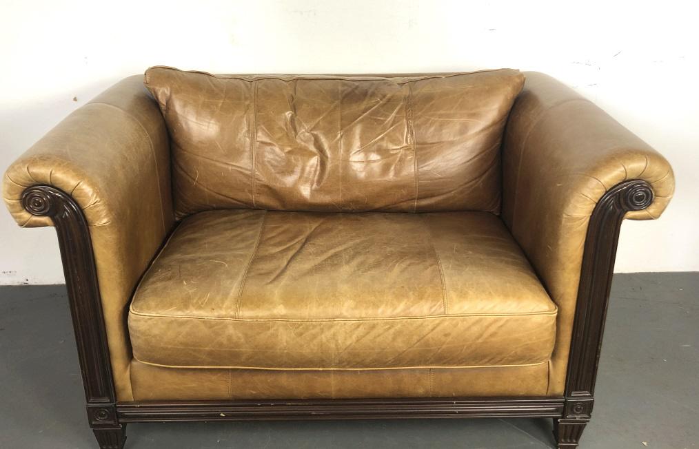A Leather Loveseat Manufactured by Bernhardt. 34 1/2"h: Manufactured by Bernhardt. 34 1/2"h x 61"w x 37 1/2"d Condition, overall wear, scratches, scuffs , some small tears