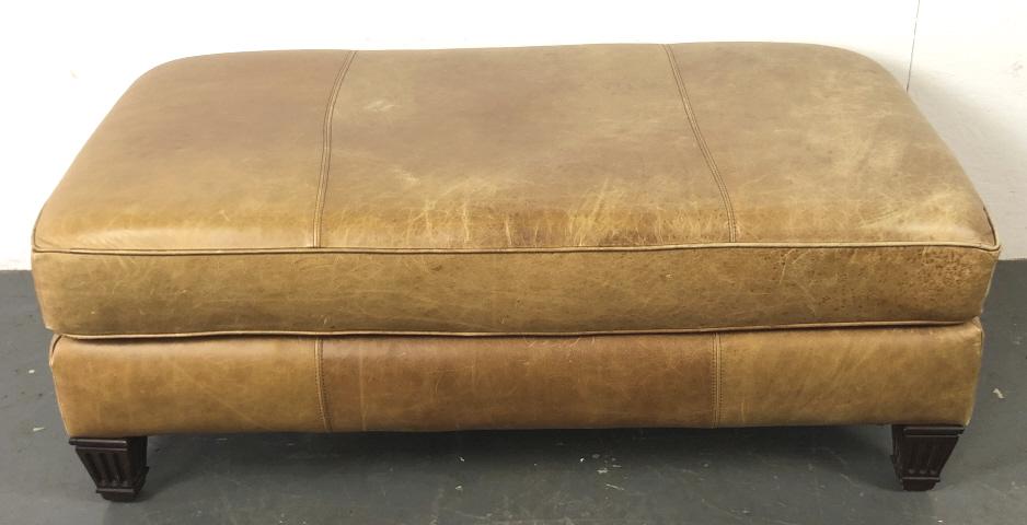 Light Brown Leather Ottoman 18"h x 48"w x 26"d.: 18"h x 48"w x 26"d. Condition, some scratches and scuffs, some wear