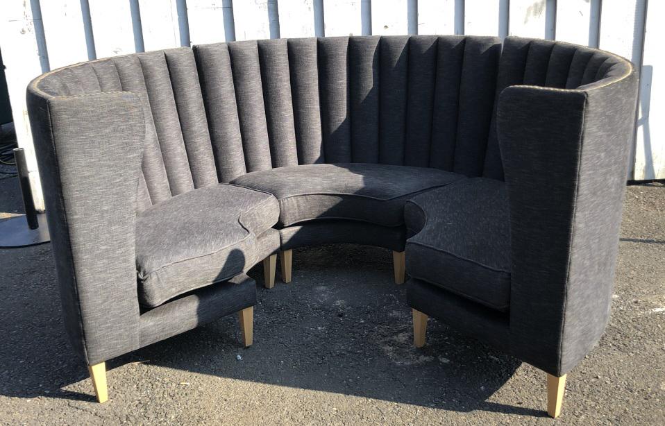 Semi Circular Upholstered Banquette 44 1/4" x 91": 44 1/4" x 91" diameter. Comes in 3 sections. Condition, some scratches and scuffs to legs, one worn edge