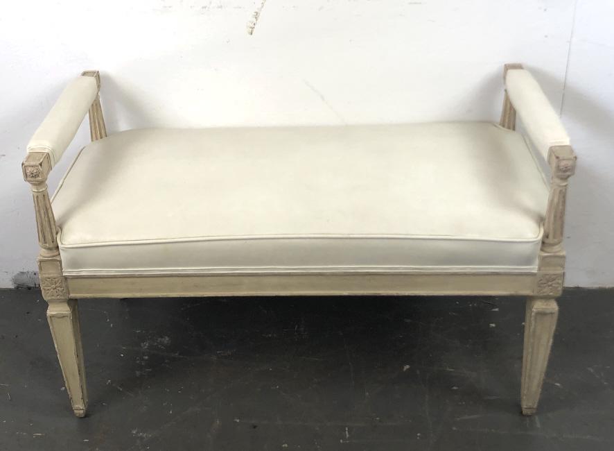 Louis the XVl Style Cream Painted Bench With vinyl: With vinyl upholstery. 24"h x 38"w x 19"d. Condition, worn paint, scratches and scuffs