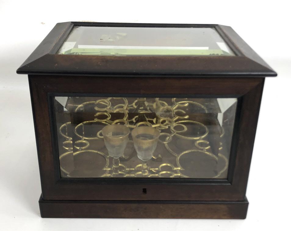 Mahogany and Beveled Glass Tantalus 10 1/2"h x13 1/2"w: 10 1/2"h x13 1/2"w x 10 1/4"d. Condition, needs cleaning, missing glasses and decanters, missing key escutcheon