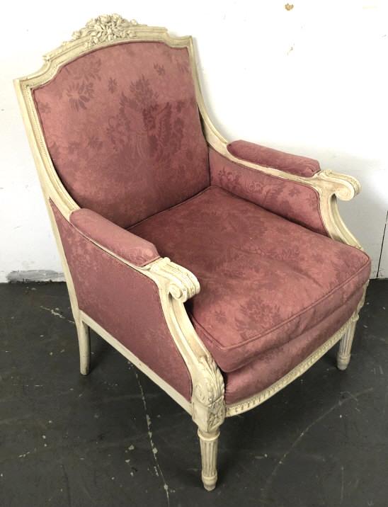 A Louis the XVl Style Upholstered Bergere 38 1/2"h x 25: 38 1/2"h x 25 1/4"w x 27"d Condition, sun faded fabric, scratches and scuffs
