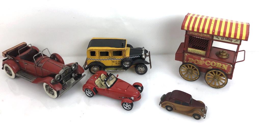 A Group of Model Cars and a Popcorn Cart Popcorn cart: Popcorn cart is 9 1/2"h. Condition, scratches and scuffs
