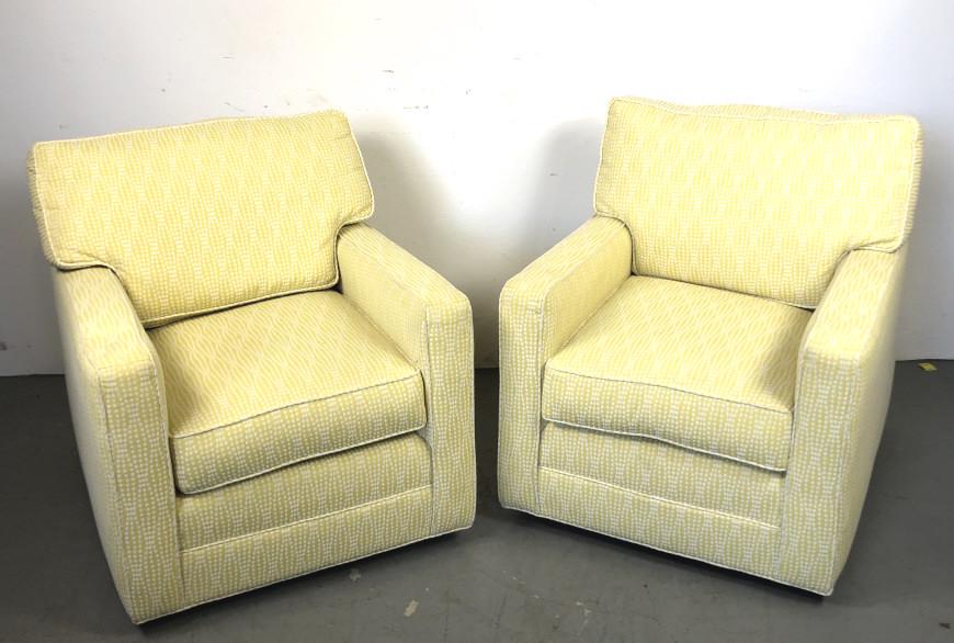 A Pair of Yellow Upholstered Swivel Lounge Chairs: Manufactured by Calico Corners. 36"h x 30"w x 36"d. Condition, lightly used