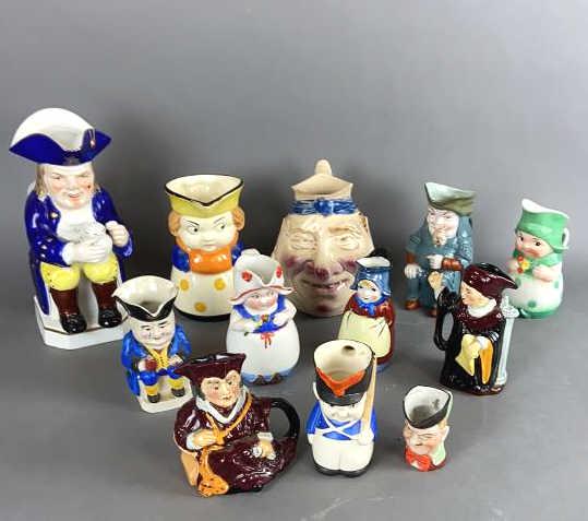 A Group of Figural Mugs and Figural Bank. 12 pieces (1 of 12)