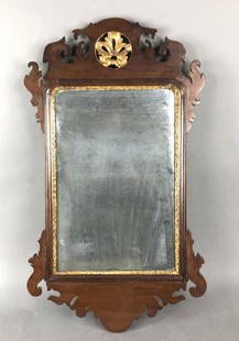 A Queen Anne Mahogany Mirror: 30 1/4"h x 17 1/2"w. Condition, silvering on mirror tarnished.