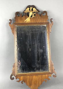 A Queen Anne Walnut Mirror: 32 1/4"h x 17 1/4"w. Condition, some loss of silvering on mirror, some chipped veneer