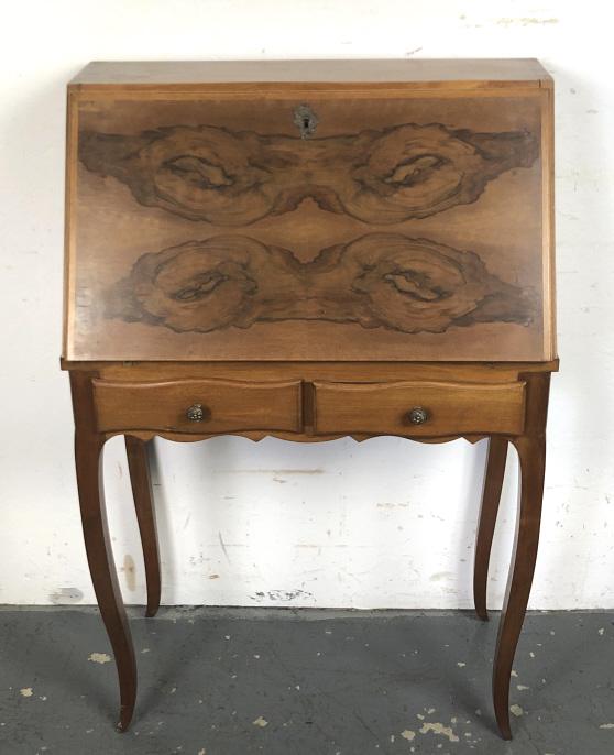 A Louis XV Walnut Slant Front Desk: 42 1/2"h x 28"w x 15 1/2"d Condition, scratches and scuffs, some water damage to top, some chipped veneer