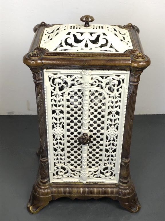 Cast Iron & Enamel Stove Cover 34 1/2"h x 22"w x 17 1/2"d. Condition, some cracks and chipped enamel: 34 1/2"h x 22"w x 17 1/2"d. Condition, some cracks and chipped enamel