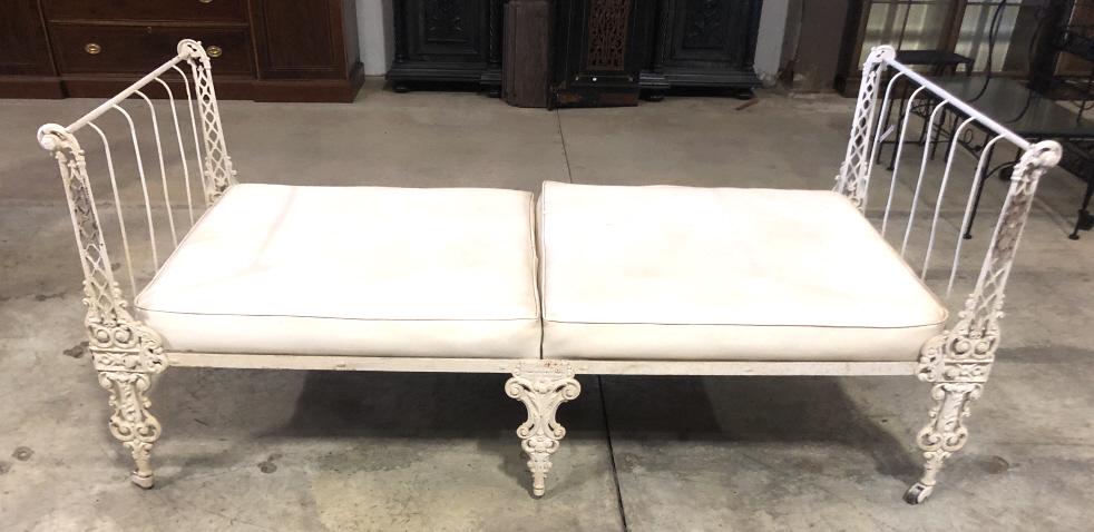 Victorian Cast Iron Day Bed 34"h x 78 1/2"w x 38"d. Condition, 3 wheels missing , vinyl cushions (1 of 5)
