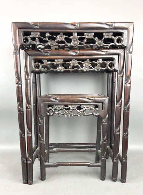 Nest of 3 Chinese Hardwood Tables: 28"h x 19.5"w x 14"d Condition, some open seams, chip to back of one stretcher.