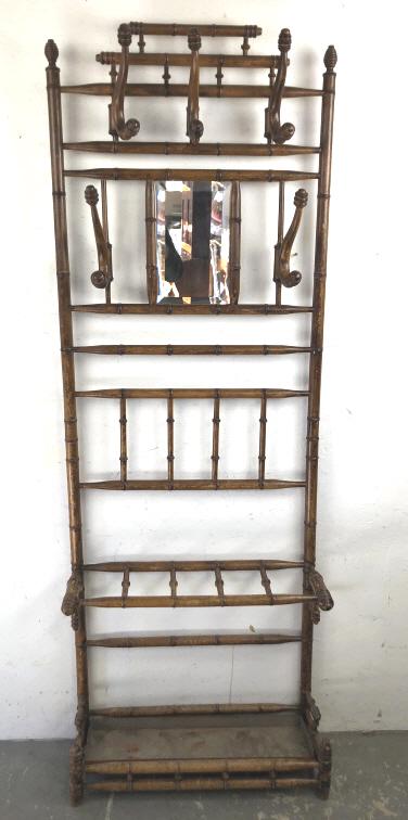A Bamboo Hall Tree: With umbrella stand and coat hangers. 79 1/4" H x 28" w x 10 1/4" d Condition, overall wear, loss of paint , scratches and scuffs