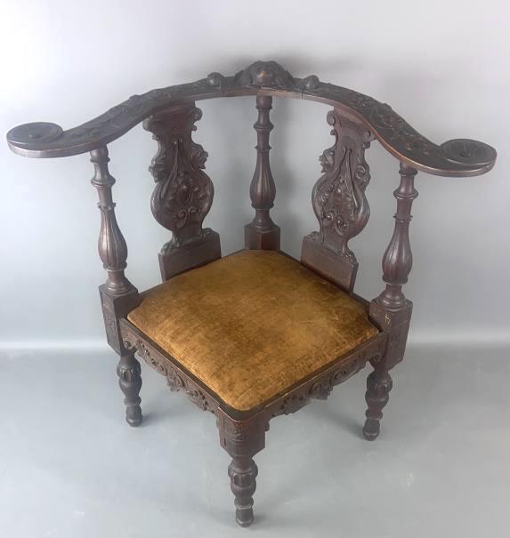 Carved Oak Corner Chair: 30"h x 25"w x 25.5"d Condition, scratches, scuffs, cracks, wobbly, chips, little missing pieces.