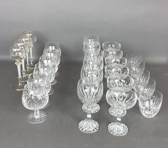 Group of Baccarat Crystal Glasses: Together with 10 other glasses Apx 27 items Tallest 7"h Condition, needs cleaning, lightly used, 1 chip to base of a gold gilt glass.
