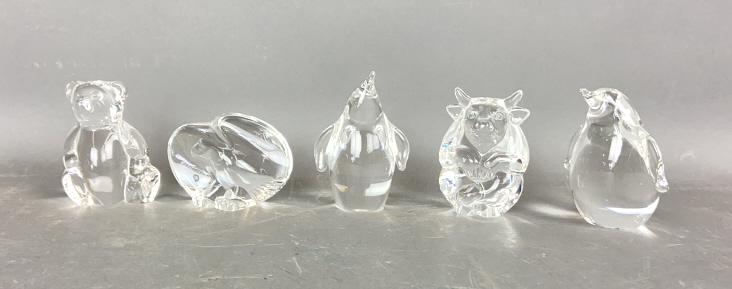 A Group of 5 Steuben Animal Figurines: Comprising of a bear, an eagle, 2 penguins, and a bull. All signed on bottom. Tallest is 2 3/4"h. Condition, good