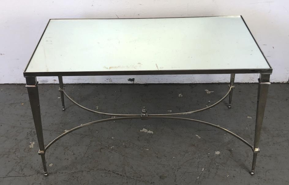 Contemporary Chrome and Mirror Low Table: 21"h x 36"w x 20 1/4"d. Condition, some minor scratches