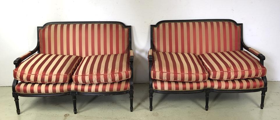 A Pair of Loius XV Style Upholstered Settees: 36"h x 52"w x 31"d. Condition, some minor stains, some pulled threads to fabric, comes with and extra roll of fabric
