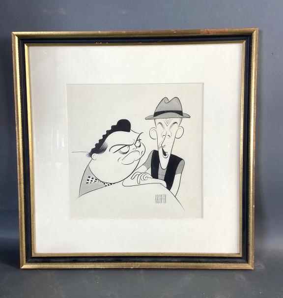 AL Hirschfeld. Norton & Ralph, "The Honeymooners": From the Estate of Michael Lang - Co-creator of the Woodstock Music Festival. Overall size is 18" x 18". Condition, scratches, scuffs and loss of gilt on frame, spots on paper and mat, some dirt under