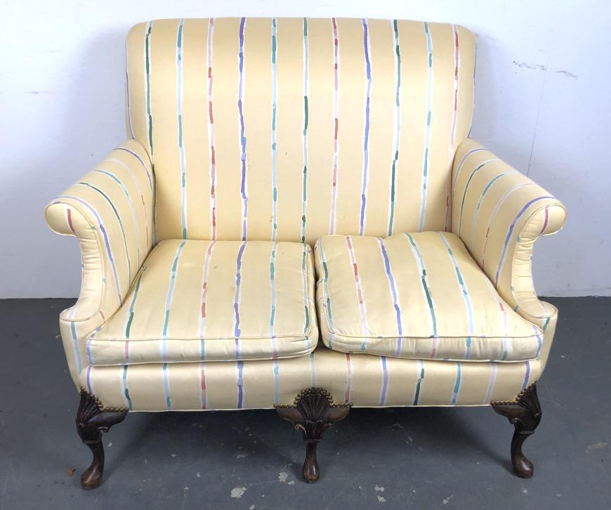 Georgian Style Mahogany & Upholstered Loveseat: Georgian Style Mahogany & Upholstered Loveseat. 39 1/4"h x 46"w x 32"d. Condition, some scratches, scuffs & chips to legs. Some stains and pen marks to fabric