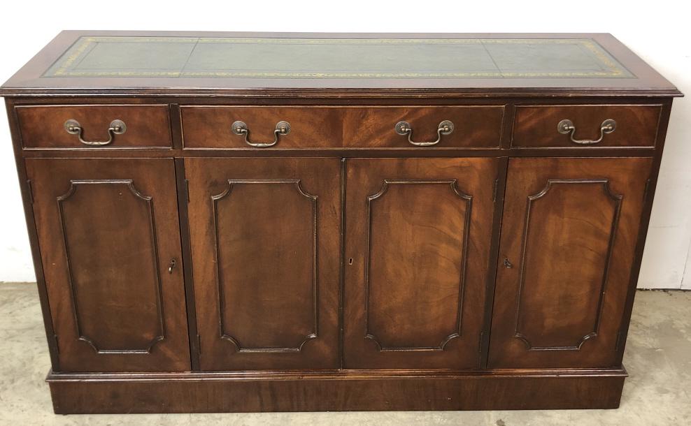 English leather top mahogany buffet: English leather top mahogany buffet. 33 1/2"h x 55 1/4"w x 18"d Condition, some scratches and scuffs, paint residue