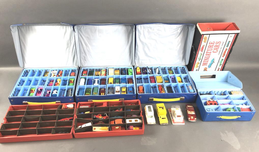 Group of Matchboxes and Other Die Cast Cars: Group of Matchboxes and Other Die Cast Cars. Together with cases. Condition, overall wear, as is, scratches and scuffs, missing tires, broken parts. Stains, scratches, scuffs and tears to cases